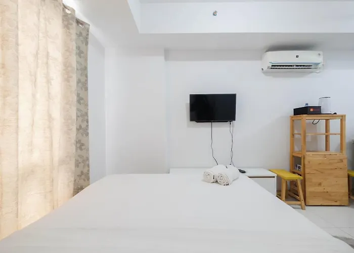 Minimalist Studio at Azalea Suites Cikarang Apartment By Travelio
